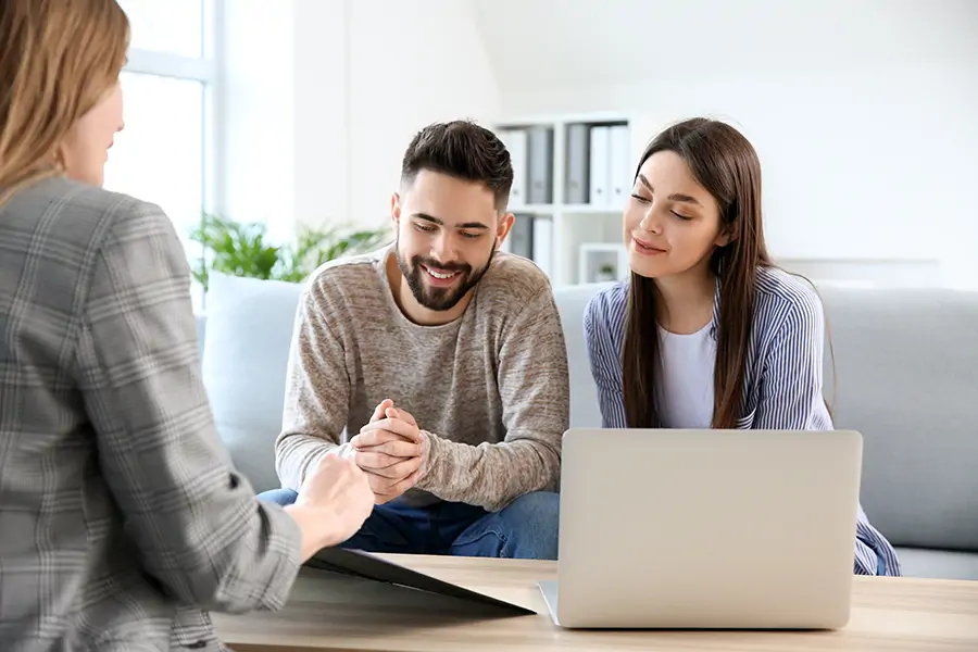 A homeowner and short sale specialist talking through options at a table